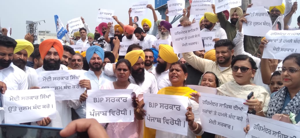AAP stages protest against centre's decision to impose GST on sarais in Golden Temple complex