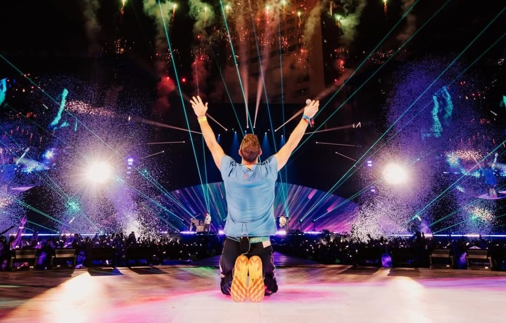Delhi-Based PR Firm’s Owner Applauds BJP’s Efforts in Bringing Coldplay to India, Highlights Economic Impact